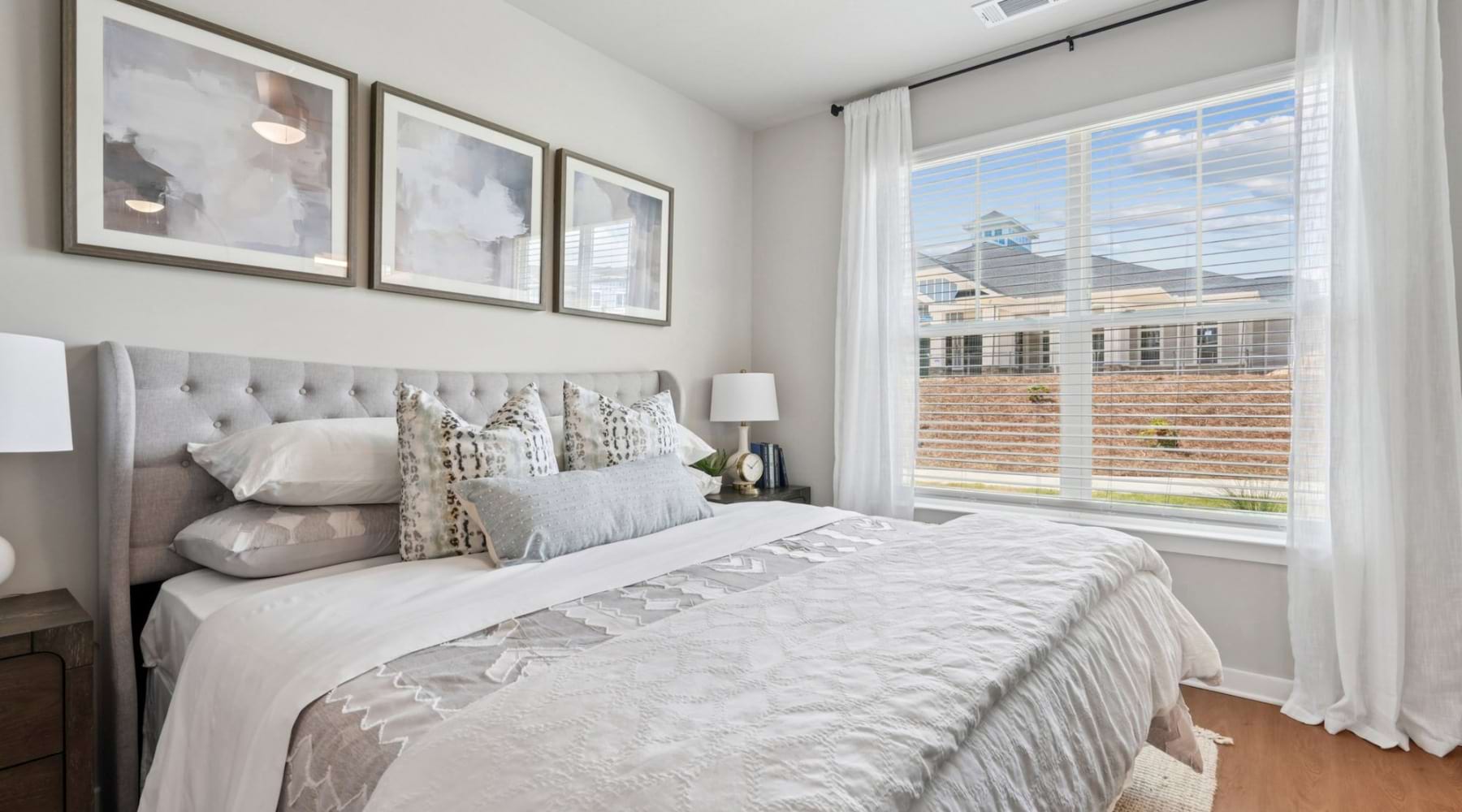 a bedroom with a large window